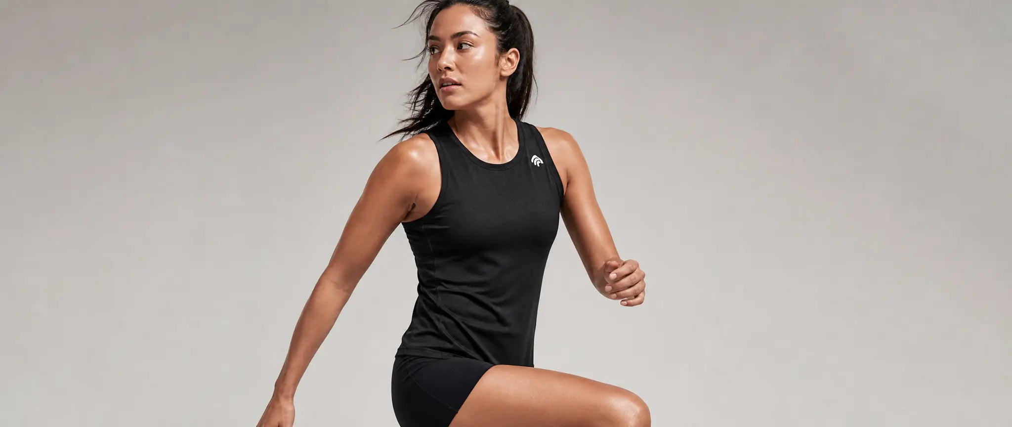 WOMEN'S RACE TOPS & SINGLETS