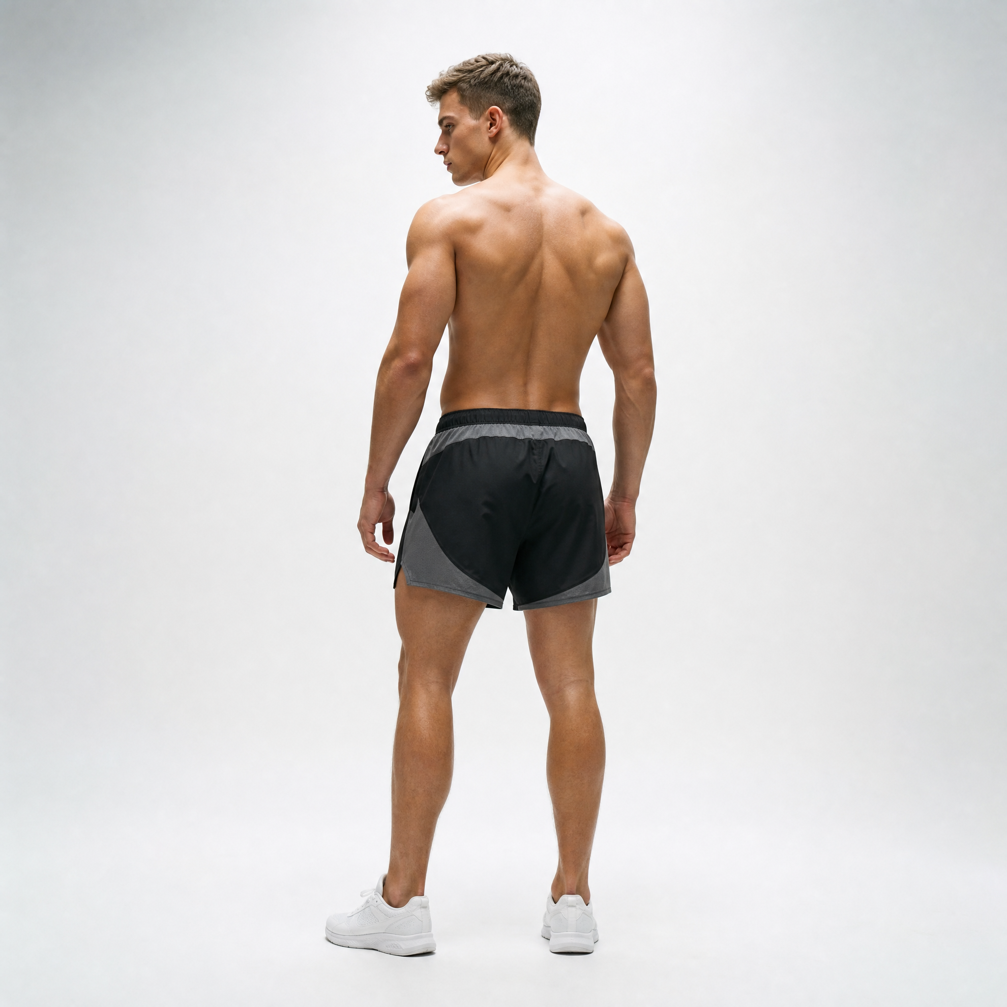Generated_with_Kive.ai_-_can_you_have_a_this_man_modeling_in_a_back_angle_these_shorts_shirtless_for_an_activewear_brand_in_a_white_backgroung_studio_that_s_a_high_professional_photo.png