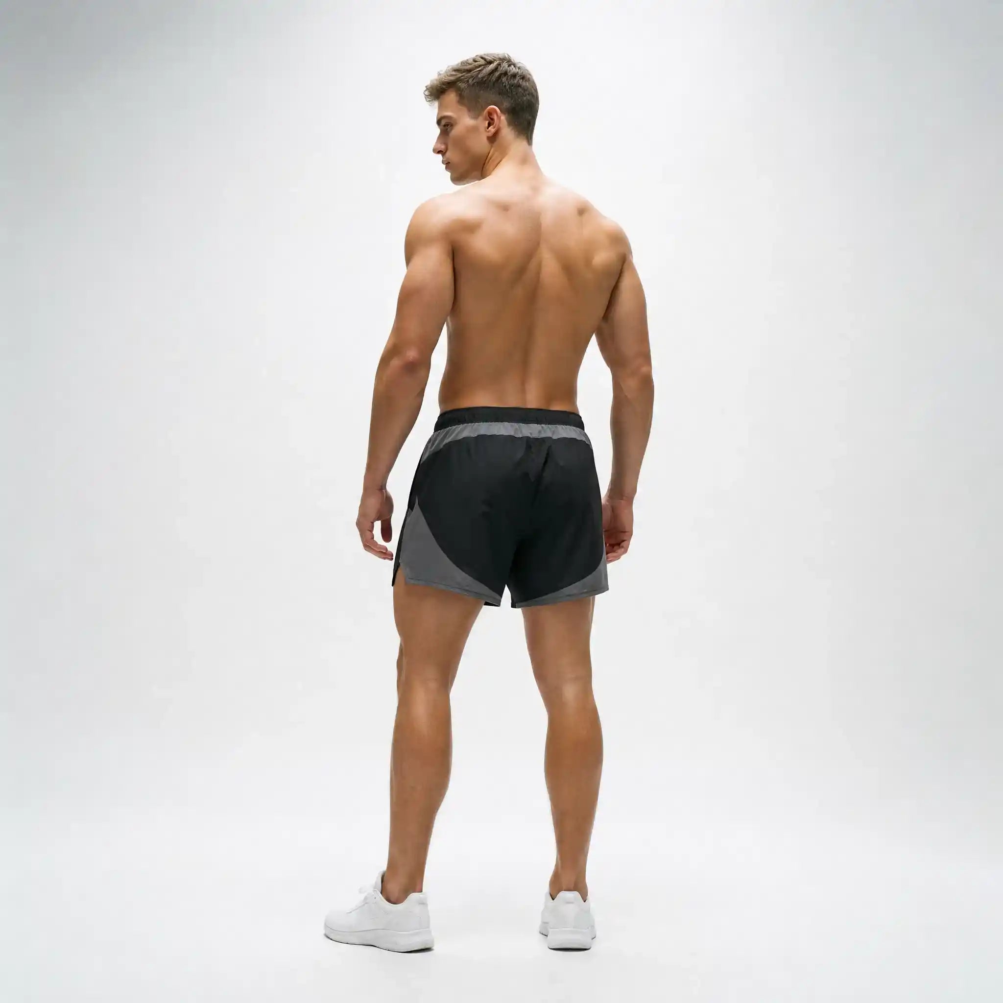 Generated_with_Kive.ai_-_can_you_have_a_this_man_modeling_in_a_back_angle_these_shorts_shirtless_for_an_activewear_brand_in_a_white_backgroung_studio_that_s_a_high_professional_photo_e2278d32-d5df-4ce9-ace1-f3d9506c7114.webp