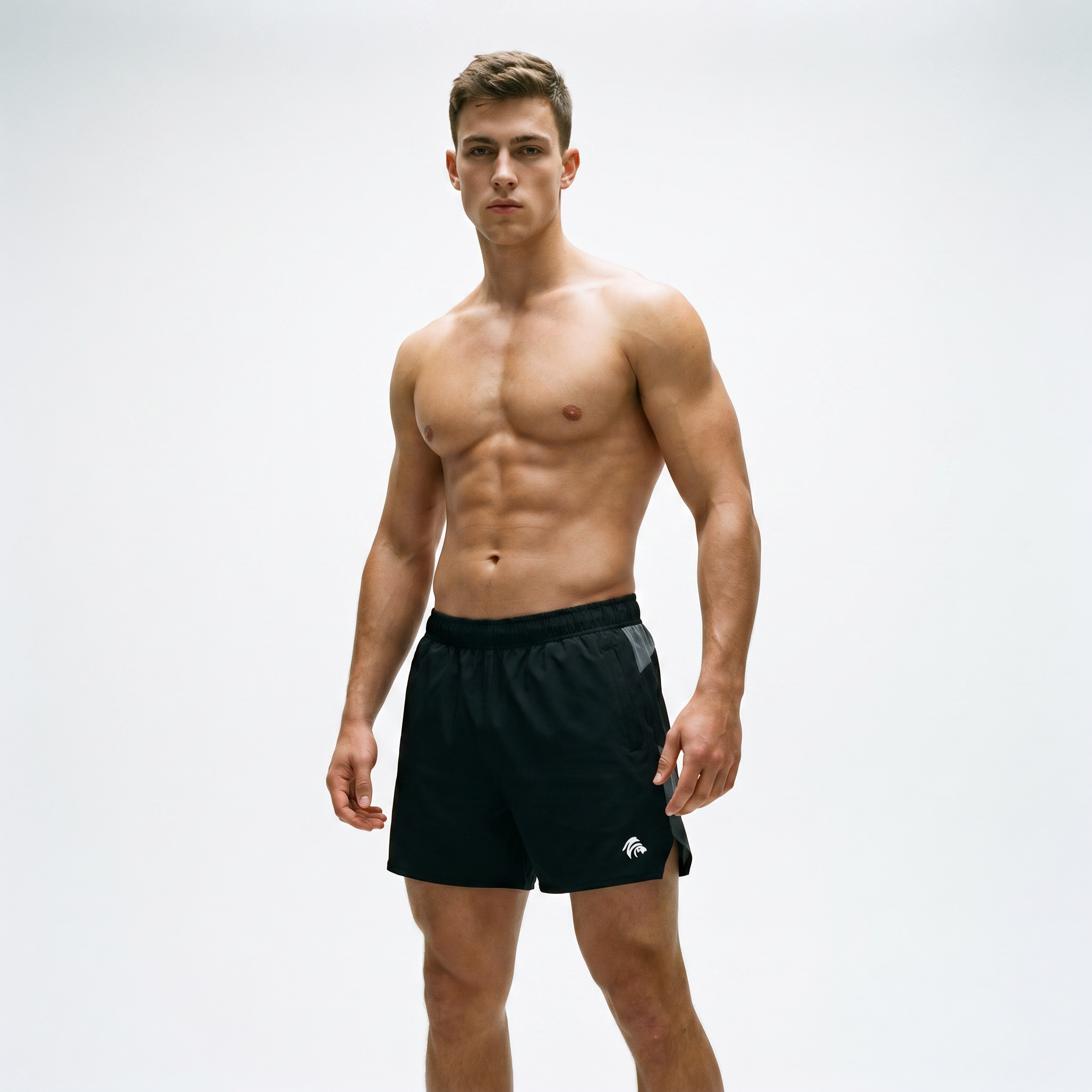 Generated_with_Kive.ai_-_can_you_have_a_young_athletic_man_modeling_these_shorts_shirtless_for_an_activewear_brand_in_a_white_backgroung_studio_that_s_a_high_professional_photo_shoot.png