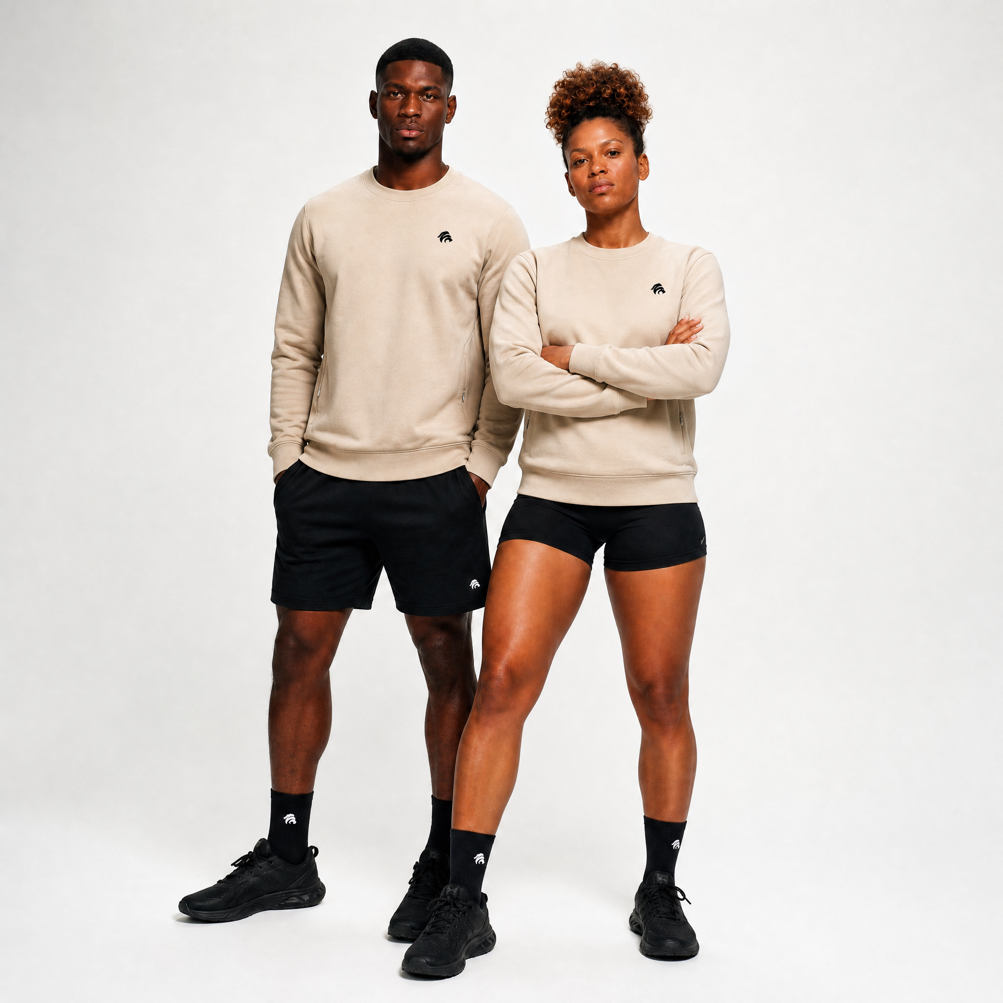 Generated_with_Kive.ai_-_can_you_have_this_man_and_woman_model_this_crewneck_sweatshirt_instead_of_the_shirts_they_re_wearing_for_an_activewear_brand_in_a_white_backgroung_studio_that.png