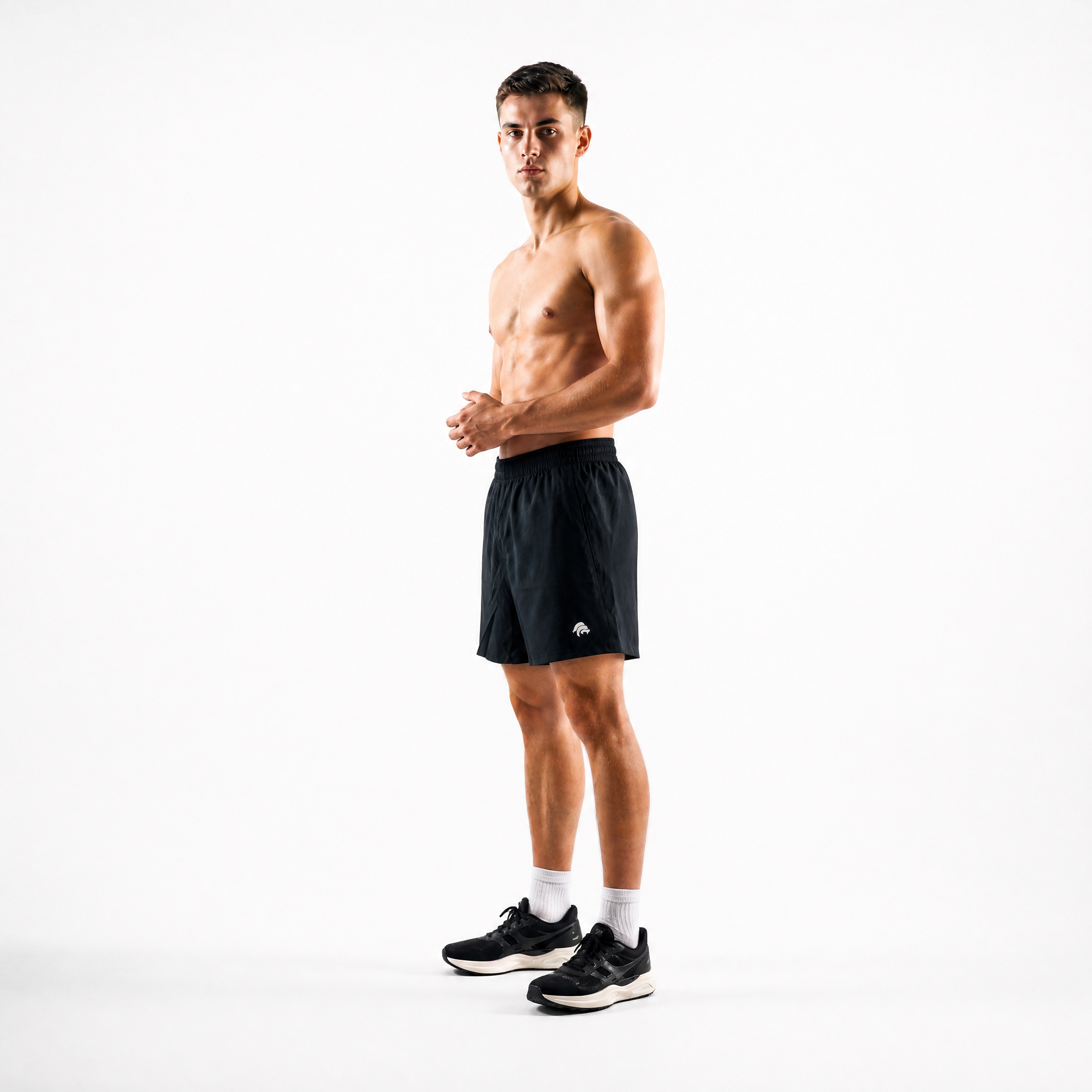 Generated_with_Kive.ai_-_can_you_have_this_man_modeling_these_shorts_instead_for_an_activewear_brand_in_a_white_background_studio_that_s_a_high_professional_photo_shoot_in_a_side_angl.png