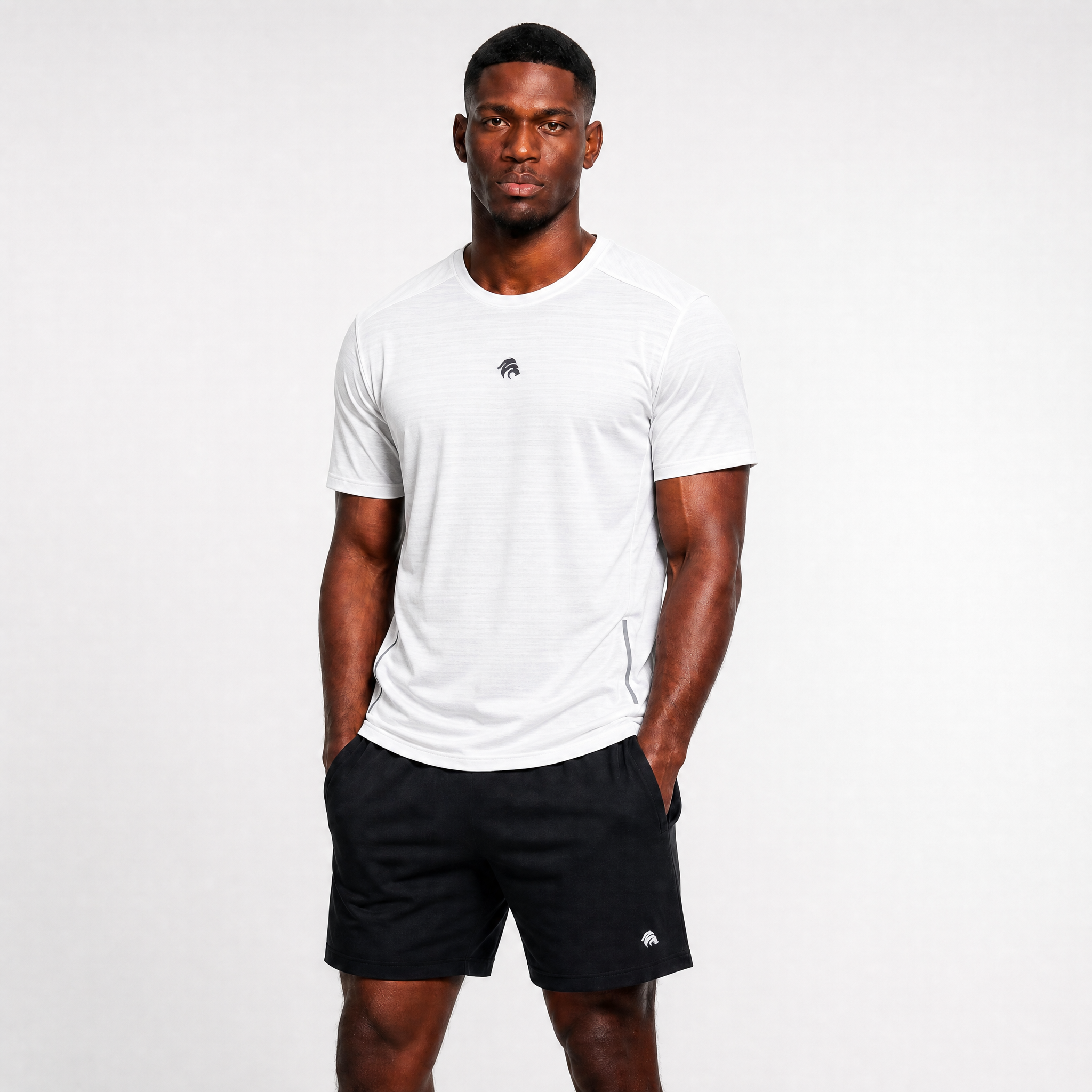 Generated_with_Kive.ai_-_can_you_have_this_man_modeling_this_white_shirt_instead_of_the_black_one_for_an_activewear_brand_in_a_white_background_studio_that_s_a_high_professional_photo.png