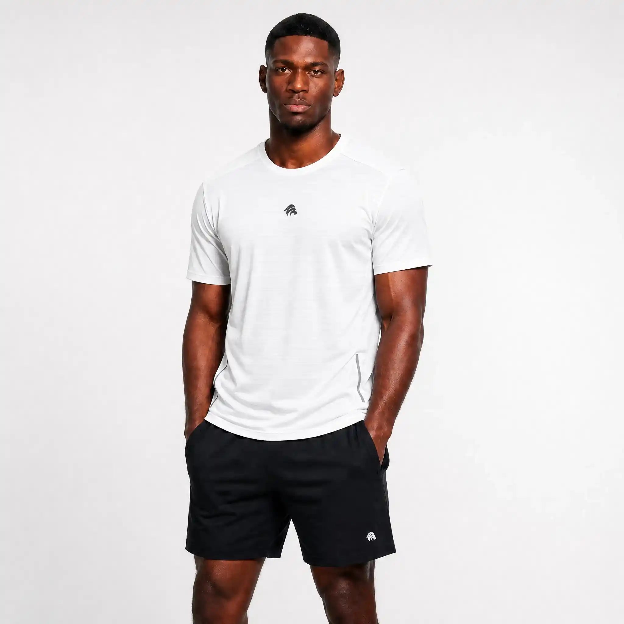 Generated_with_Kive.ai_-_can_you_have_this_man_modeling_this_white_shirt_instead_of_the_black_one_for_an_activewear_brand_in_a_white_background_studio_that_s_a_high_professional_photo_775ebaf9-bea3-44c1-9898-ed3f2452c3d7.webp