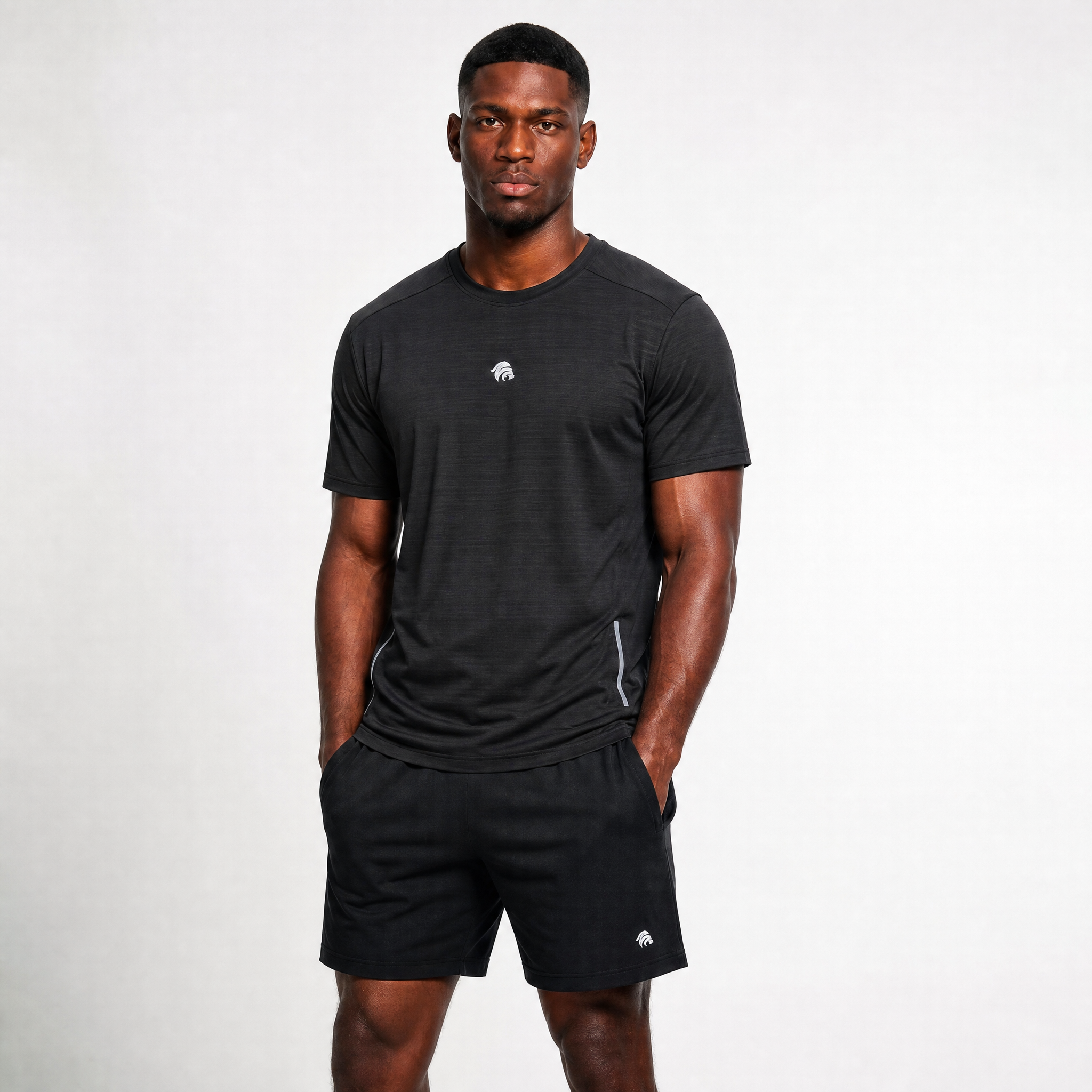 Generated_with_Kive.ai_-_can_you_just_have_this_man_modeling_this_black_shirt_for_an_activewear_brand_in_a_white_background_studio_that_s_a_high_professional_photo_shoot.png