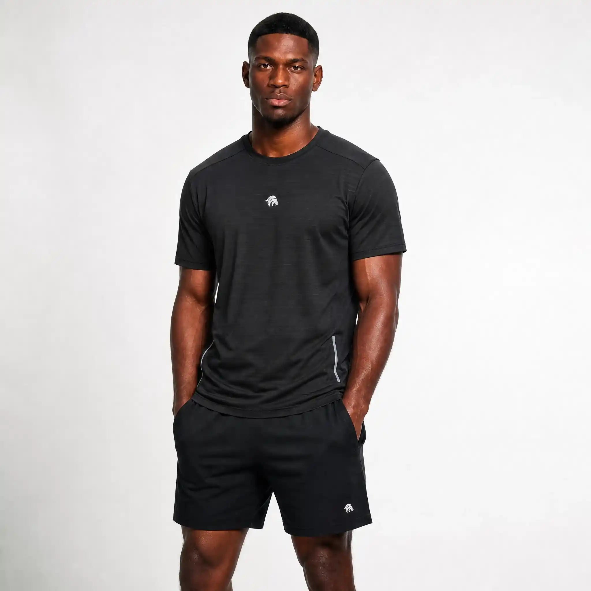 Generated_with_Kive.ai_-_can_you_just_have_this_man_modeling_this_black_shirt_for_an_activewear_brand_in_a_white_background_studio_that_s_a_high_professional_photo_shoot_8507bd40-44d7-49b8-8a5b-ba1948e1220d.webp