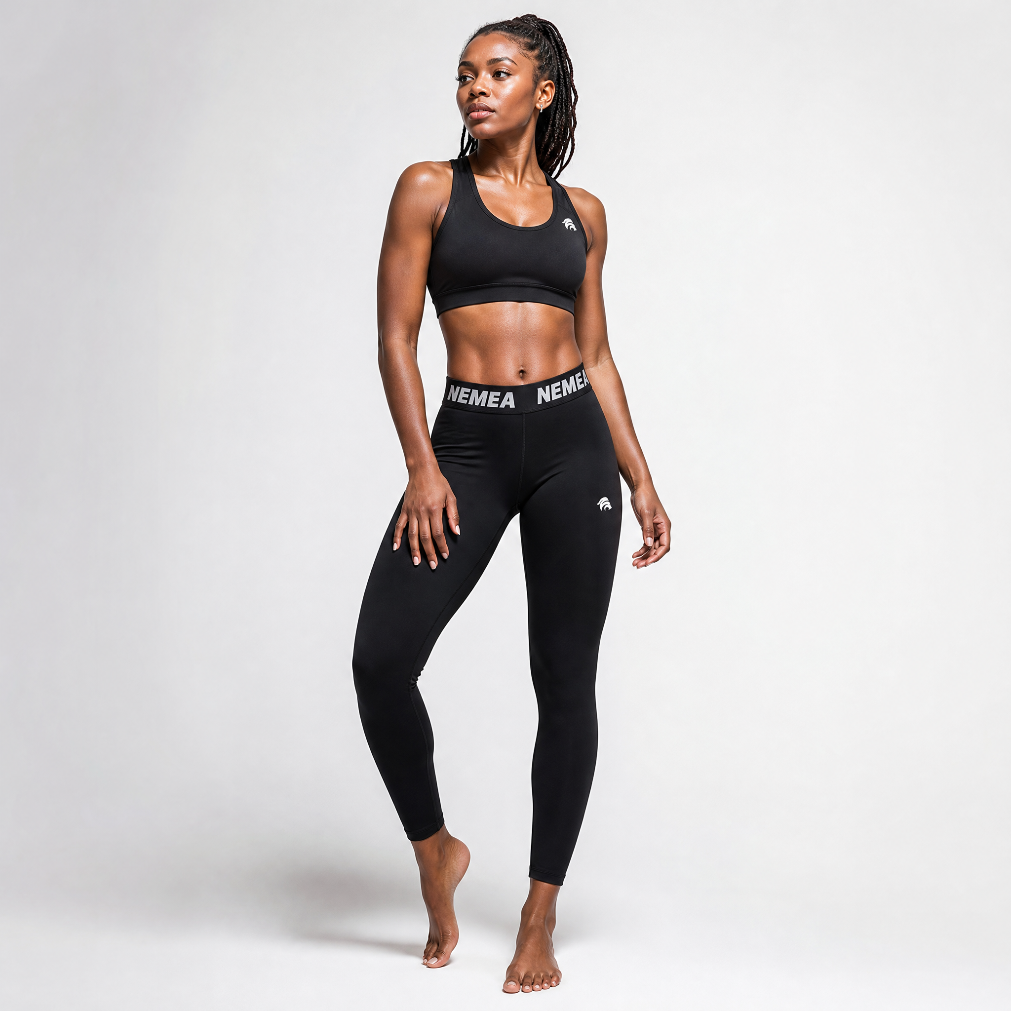 Generated_with_Kive.ai_-_have_a_yound_black_athletic_woman_modeling_these_leggings_and_sports_bra_for_an_activewear_brand_in_a_white_backgroung_studio_that_s_a_high_professional_photo.png